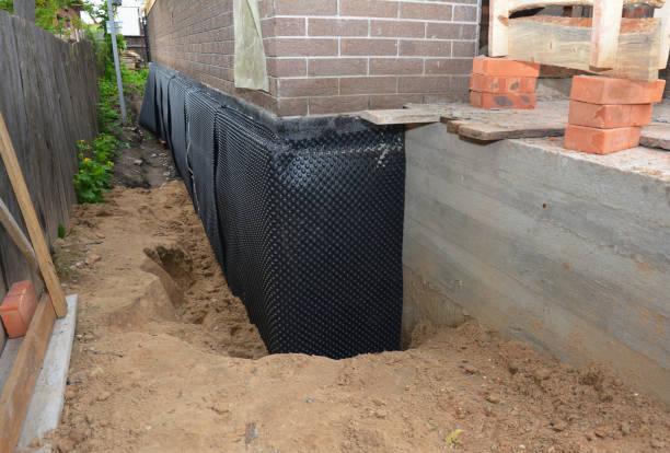Happy homeowners after waterproofing job in Jobstown